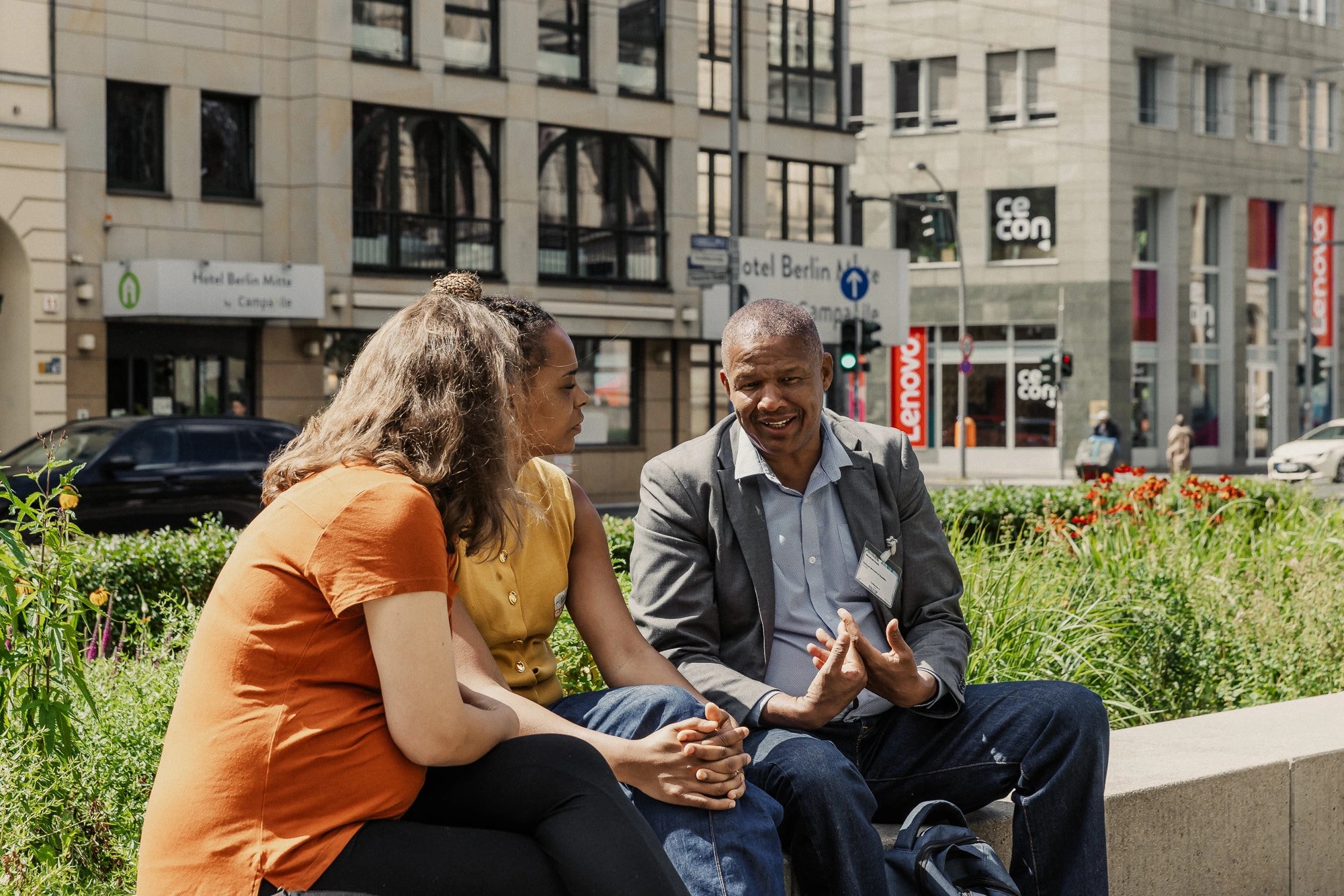 by Aja Dotson Photography people talking in front of MfN