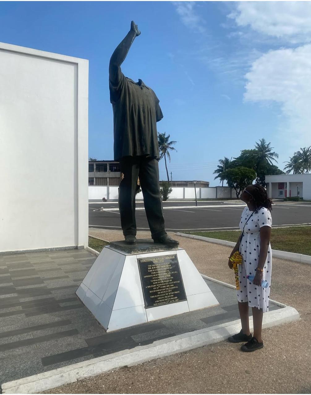 At the Dr. Kwame Nkrumah Memorial Park in Accra, I stand before the statue of Ghana’s first president during TheMuseumsLab African residency. The statue’s missing head was lost during demonstrations in which protesters looted and demolished the original monument. Today, the headless figure and raised arm stand as a powerful reminder of how political memory is contested, damaged, and reassembled, and how even monumental leaders remain part of ongoing historical struggle. At the Dr. Kwame Nkrumah Memorial Park in Accra, I stand before the statue of Ghana’s first president during TheMuseumsLab African residency.